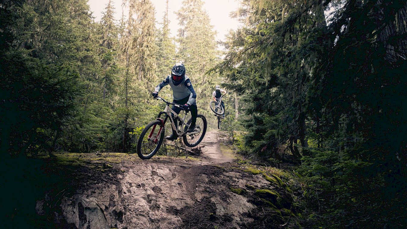 riders taking a drop